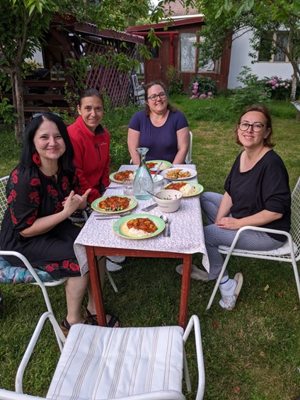 Treating our hosts to a home cooked vegan Punjabi meal. From left to right: Gabi Sebastyen, Diana Damsa, Miranda Shaw and Diana Topan. 